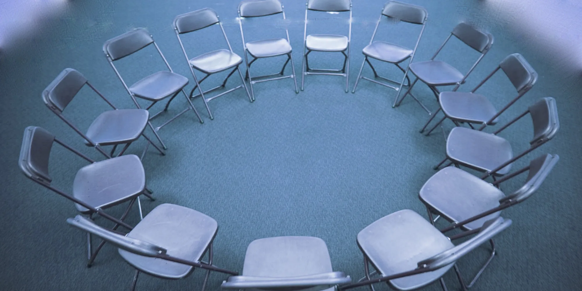 o-empty-chairs-circle-facebook